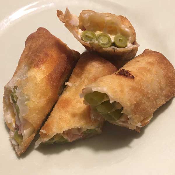Photo of deep fried eggrolls with pickled Bolder Beans green beans