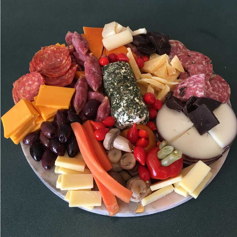 Photo of a Charcuterie Board with Bolder Mixup pickled veggies