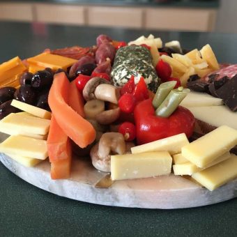 Photo of a Charcuterie Board with Bolder Mixup pickled veggies